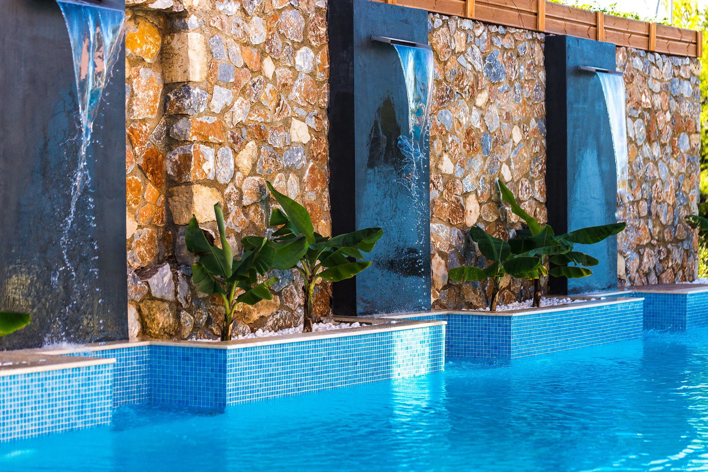 Waterfalls & plants in our pool