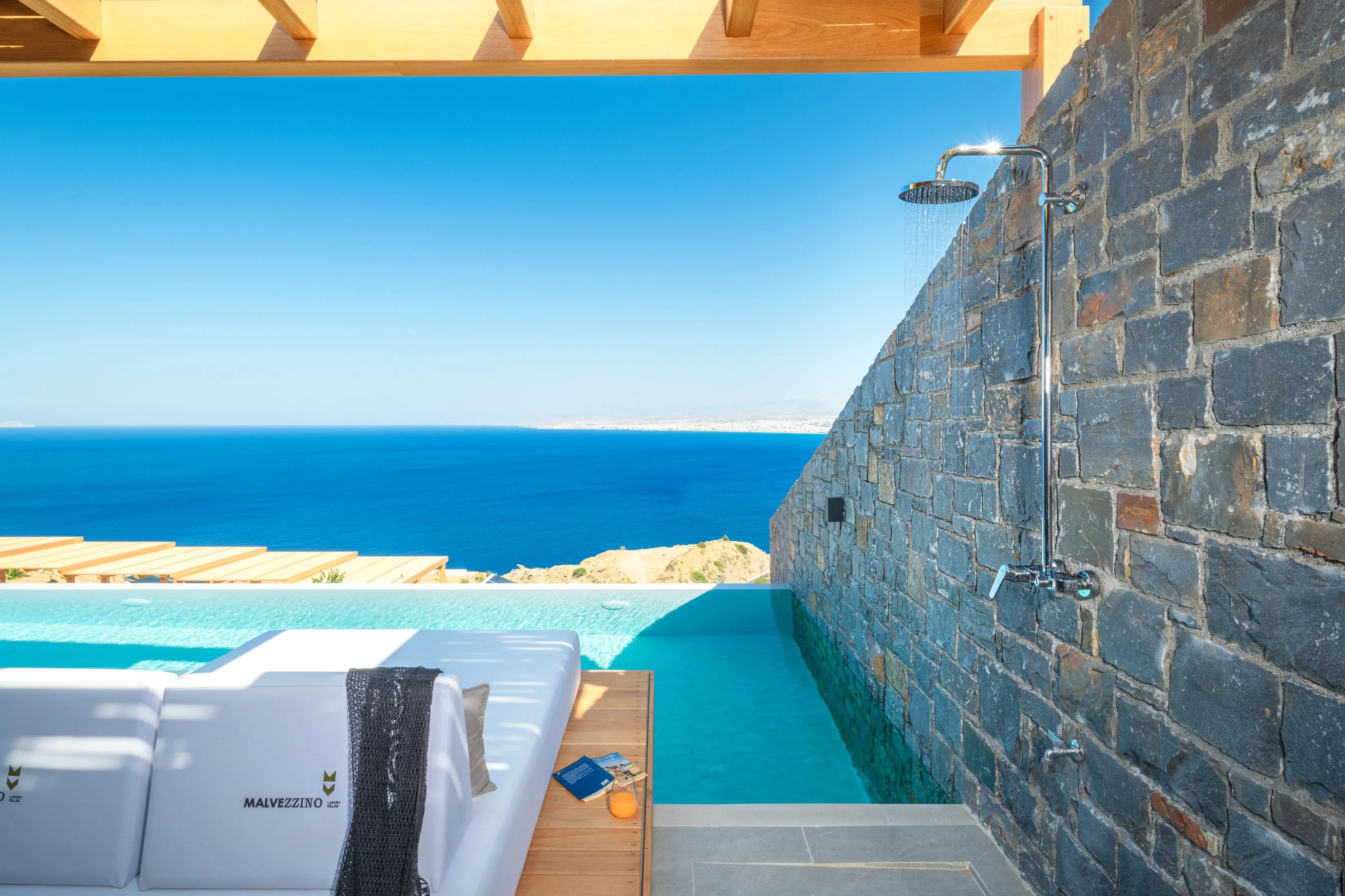 Pool towels are provided. An outdoor shower is also available.