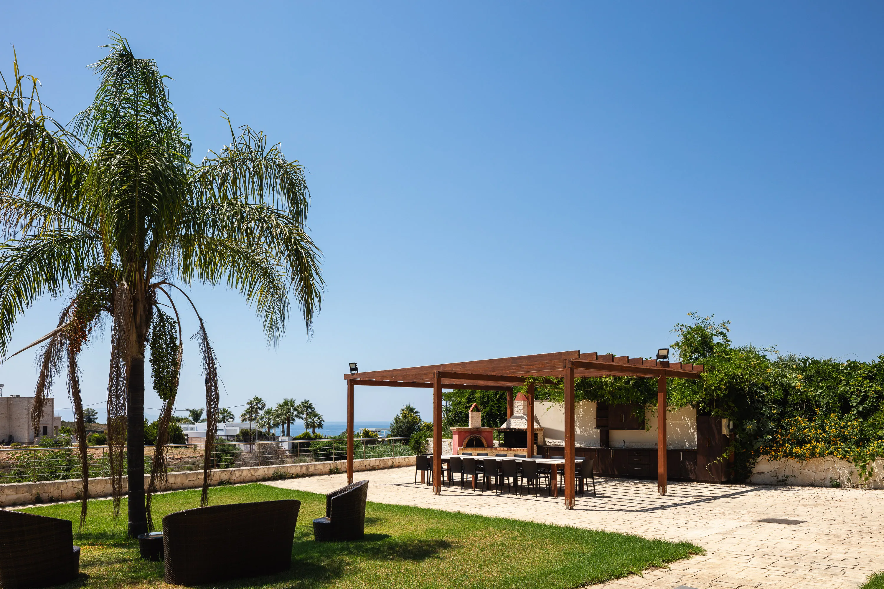 The barbecue area is located at the end of the property grounds and enjoys distant sea views towards Kalathas.
