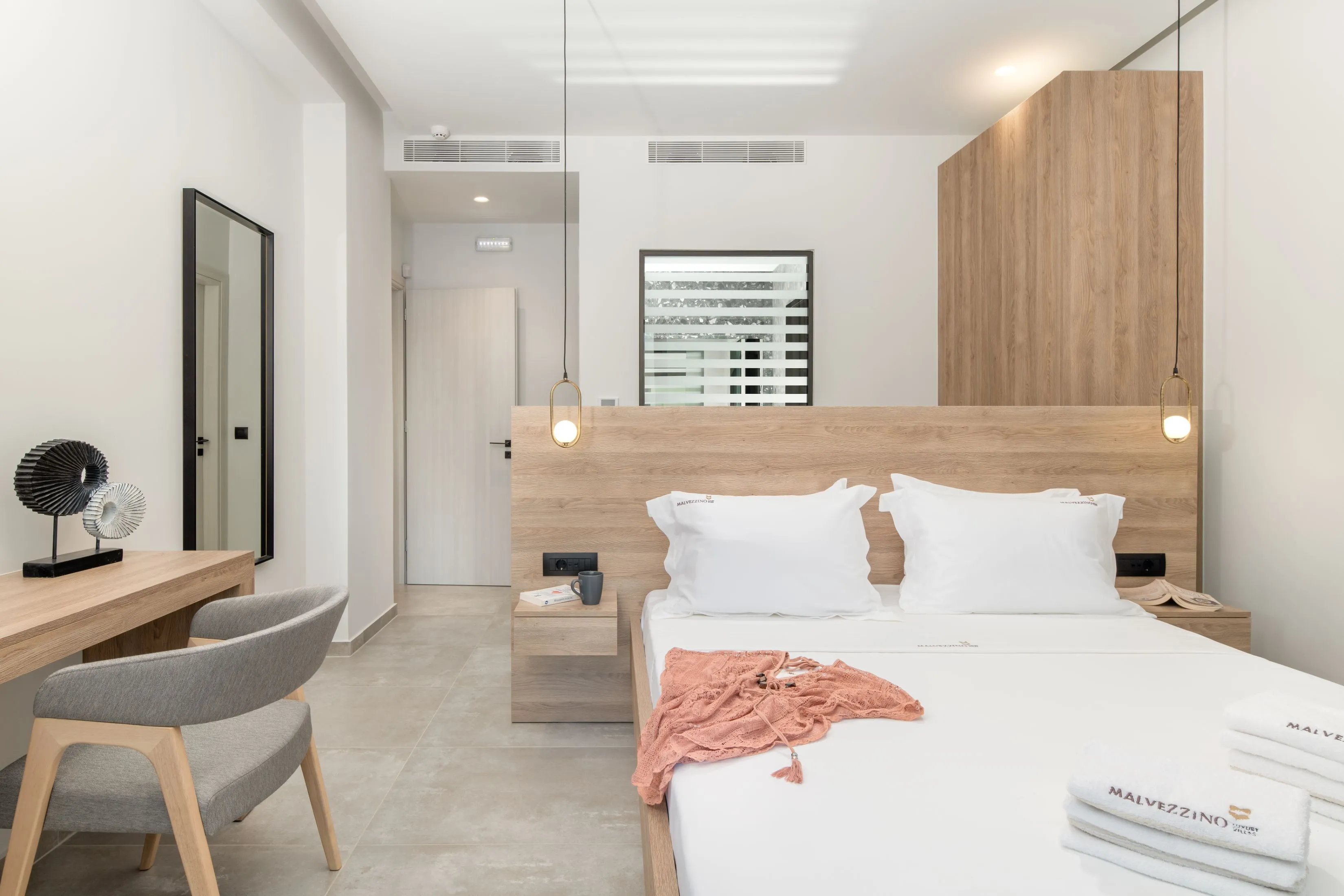 Bathroom towels and bed linen are provided.