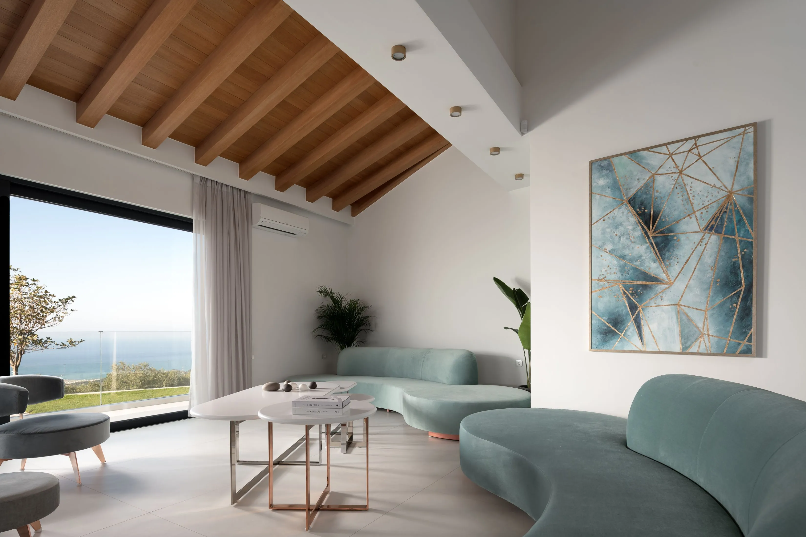 The living room opens up to the pool terrace.