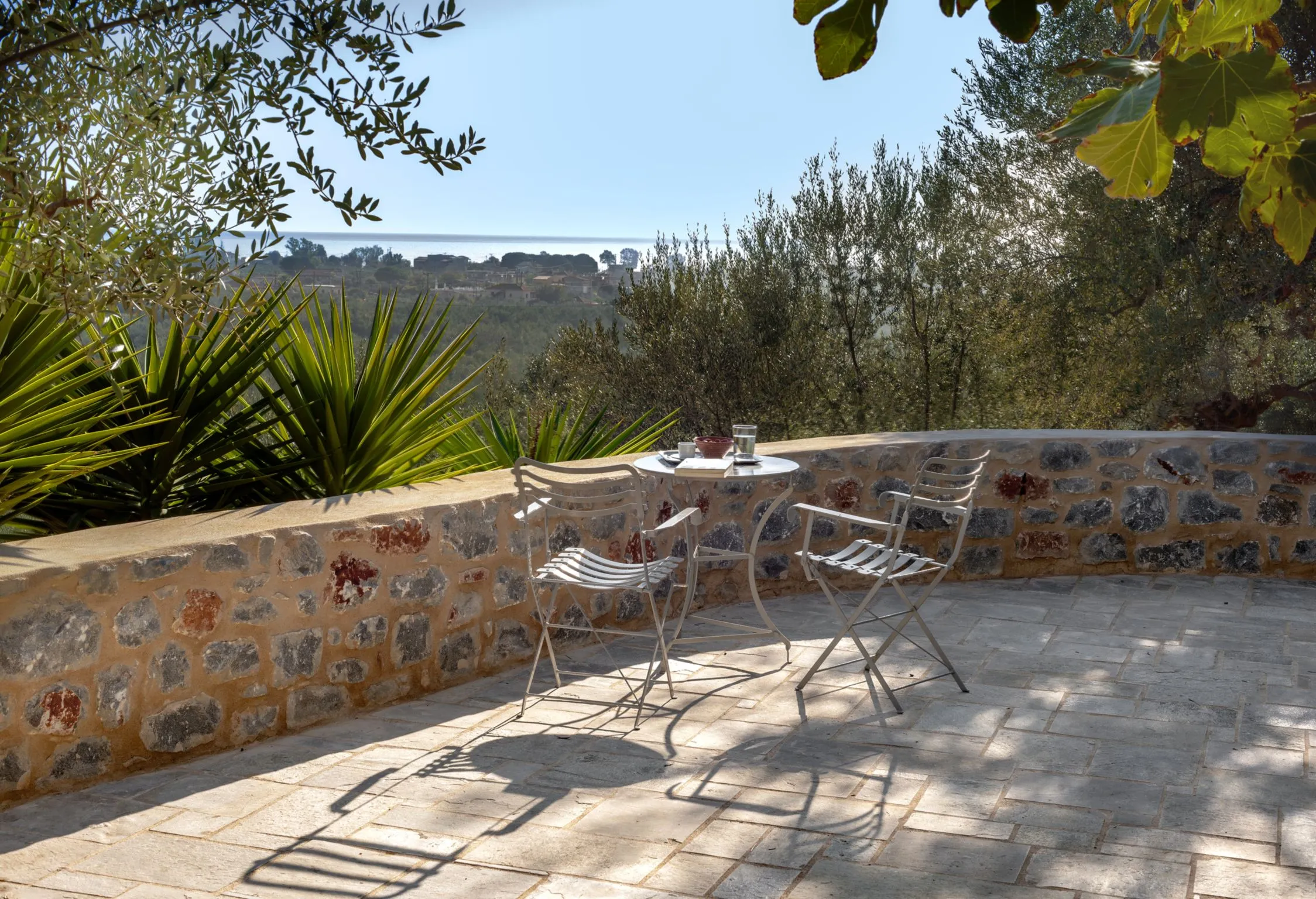 The villa enjoys sea views over the Mani countryside to the West.