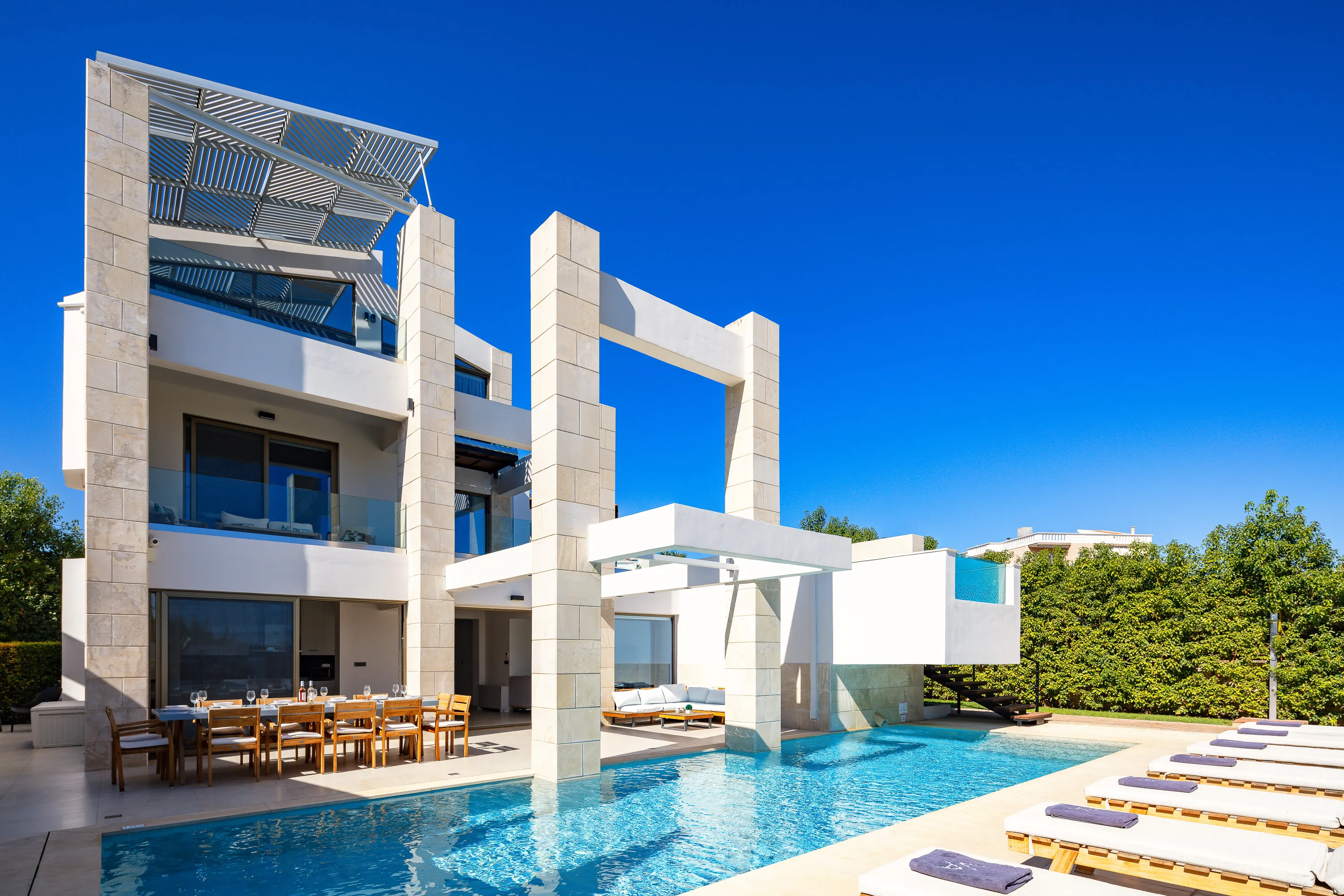 Two private heated swimming pools and spacious outdoor area.