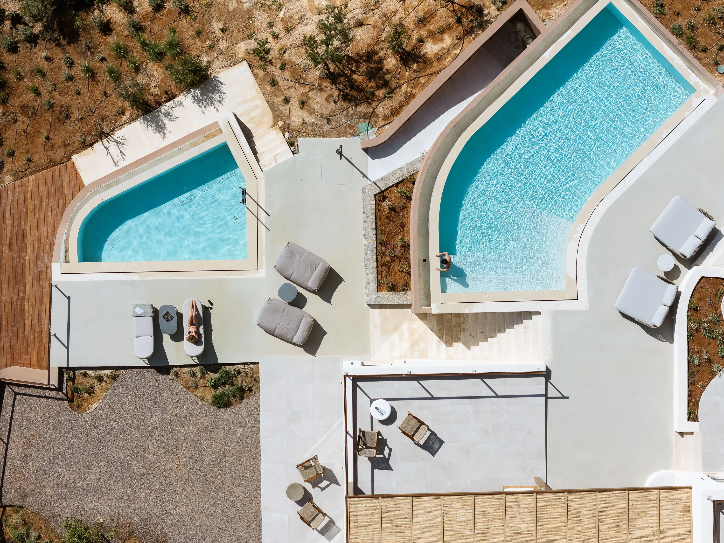 In Blue Villa also features two swimming pools, expansive outdoor spaces, panoramic sea views from every room, and a secluded beach.
