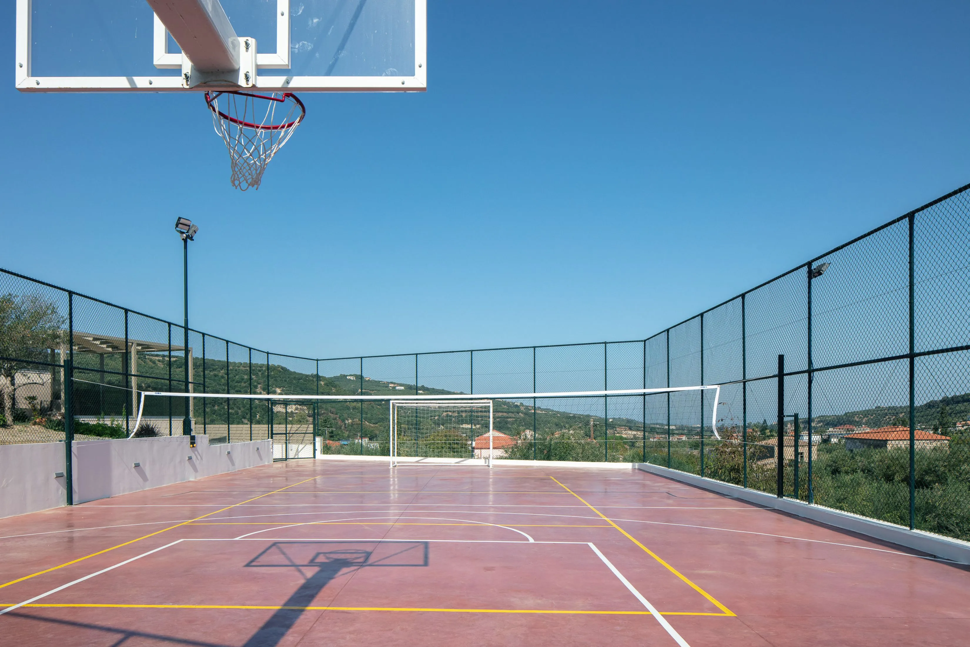 A sports field, offering facilities for many sports such as volleyball, tennis, soccer and basketball