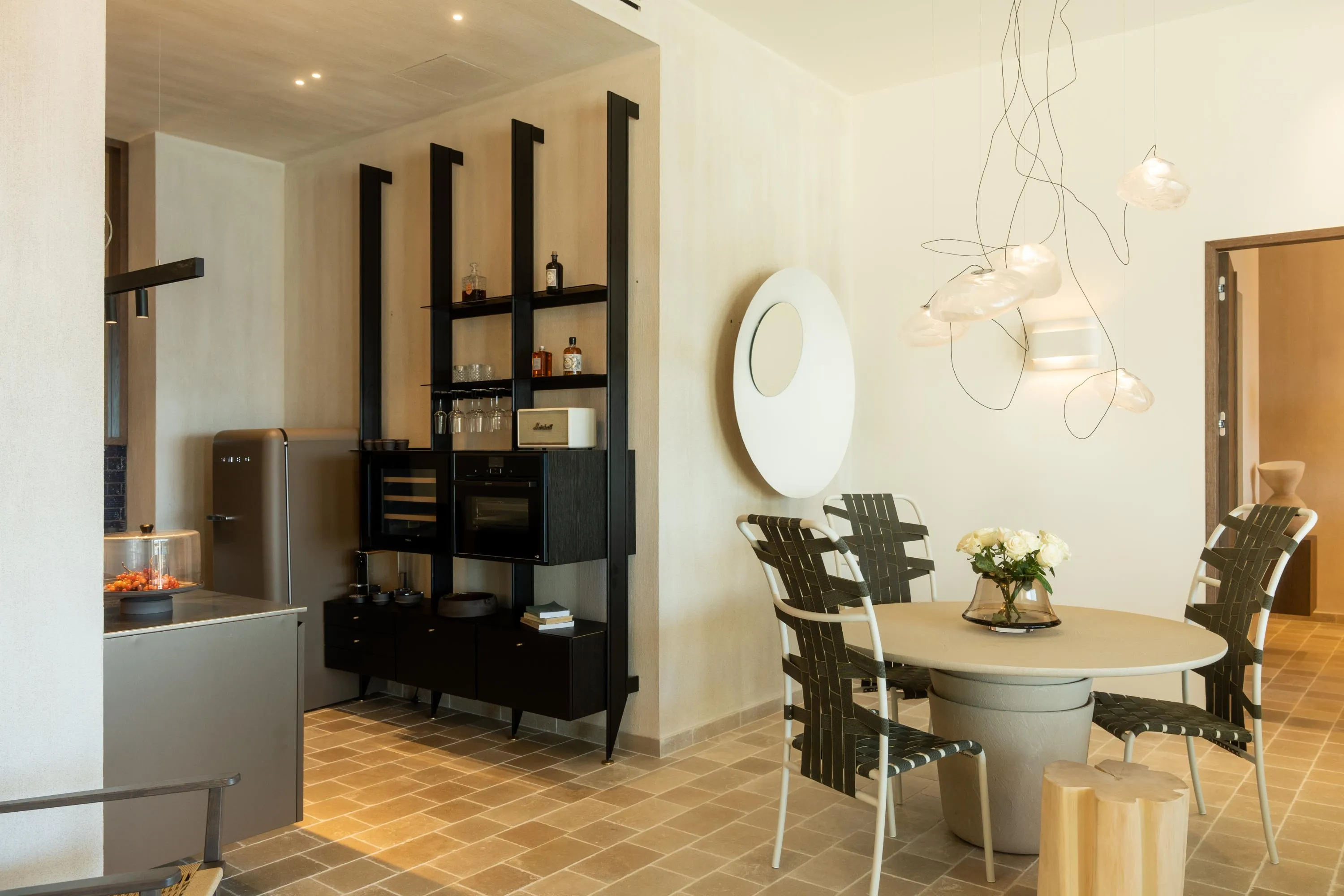 A dining table for four is also available