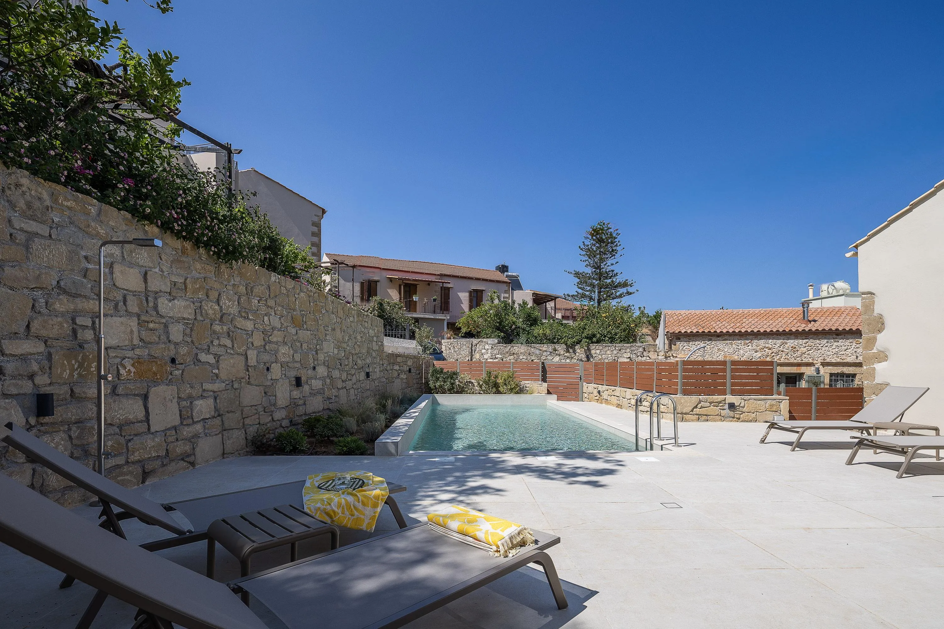 The villa is composed of two independent buildings within walking distance of each other, providing comfort and privacy for up to eight guests.