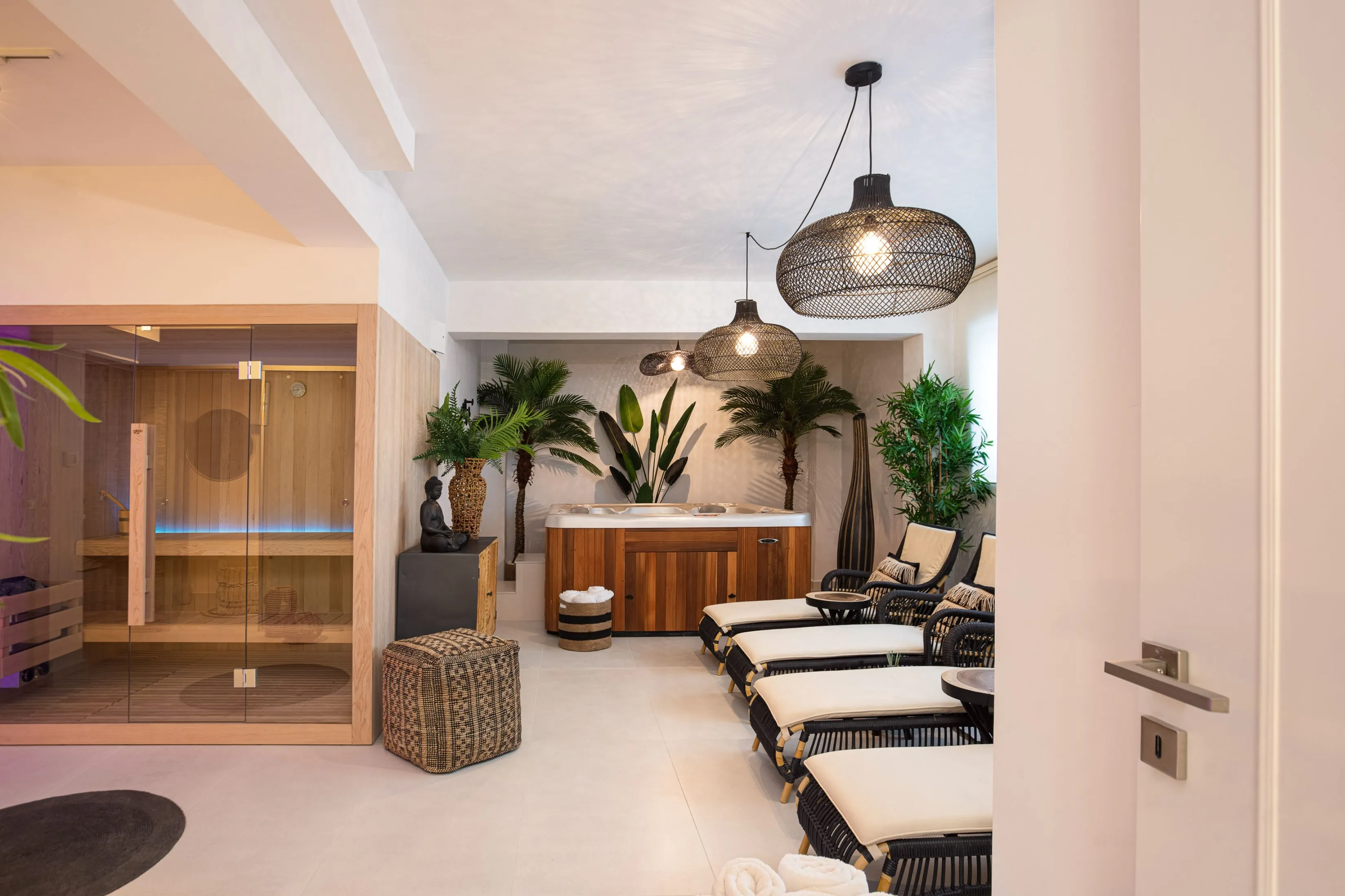 Spa area with 6 seater hot tub and 4 chaise longues