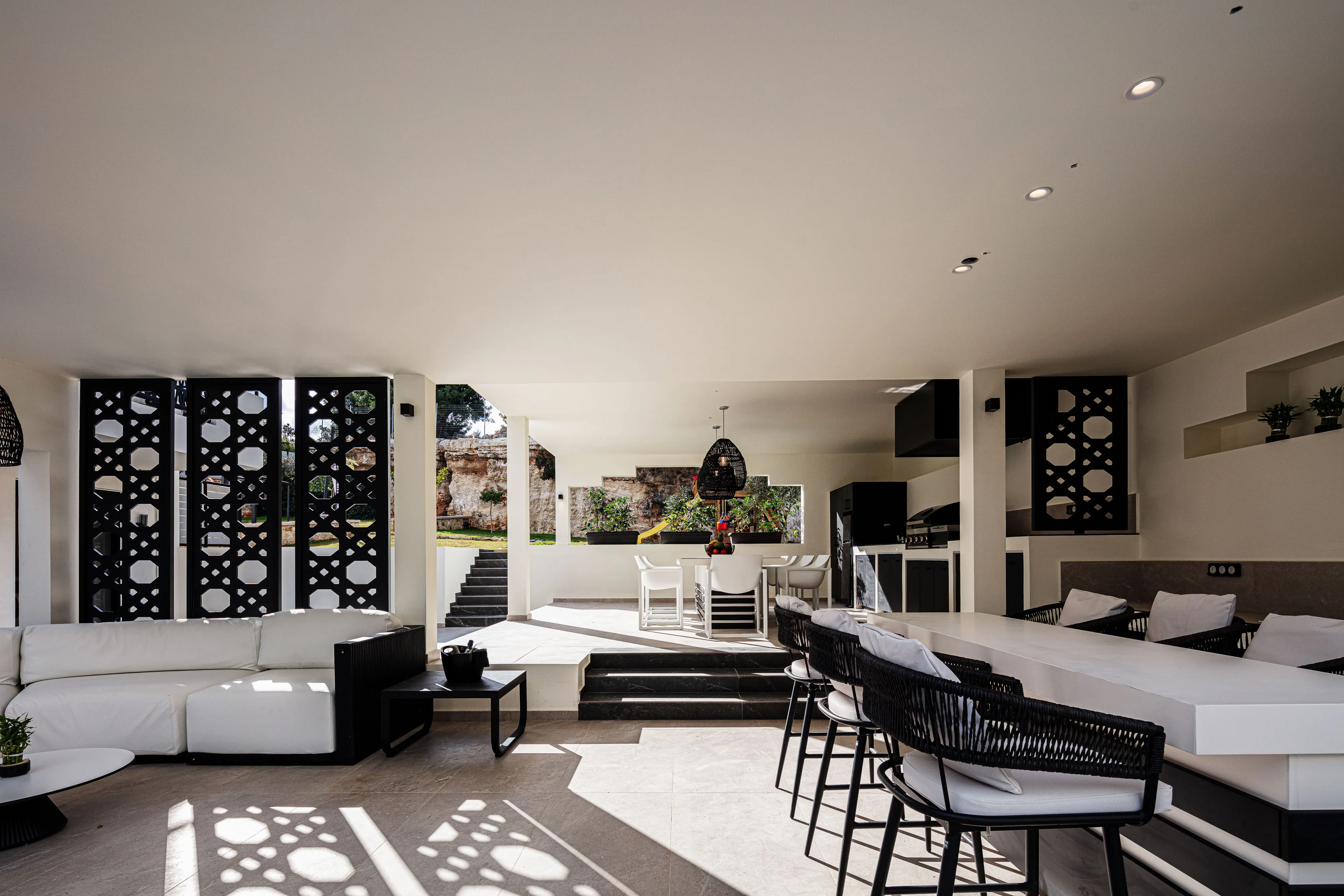 A charming outdoor dining area surrounded by serene views.