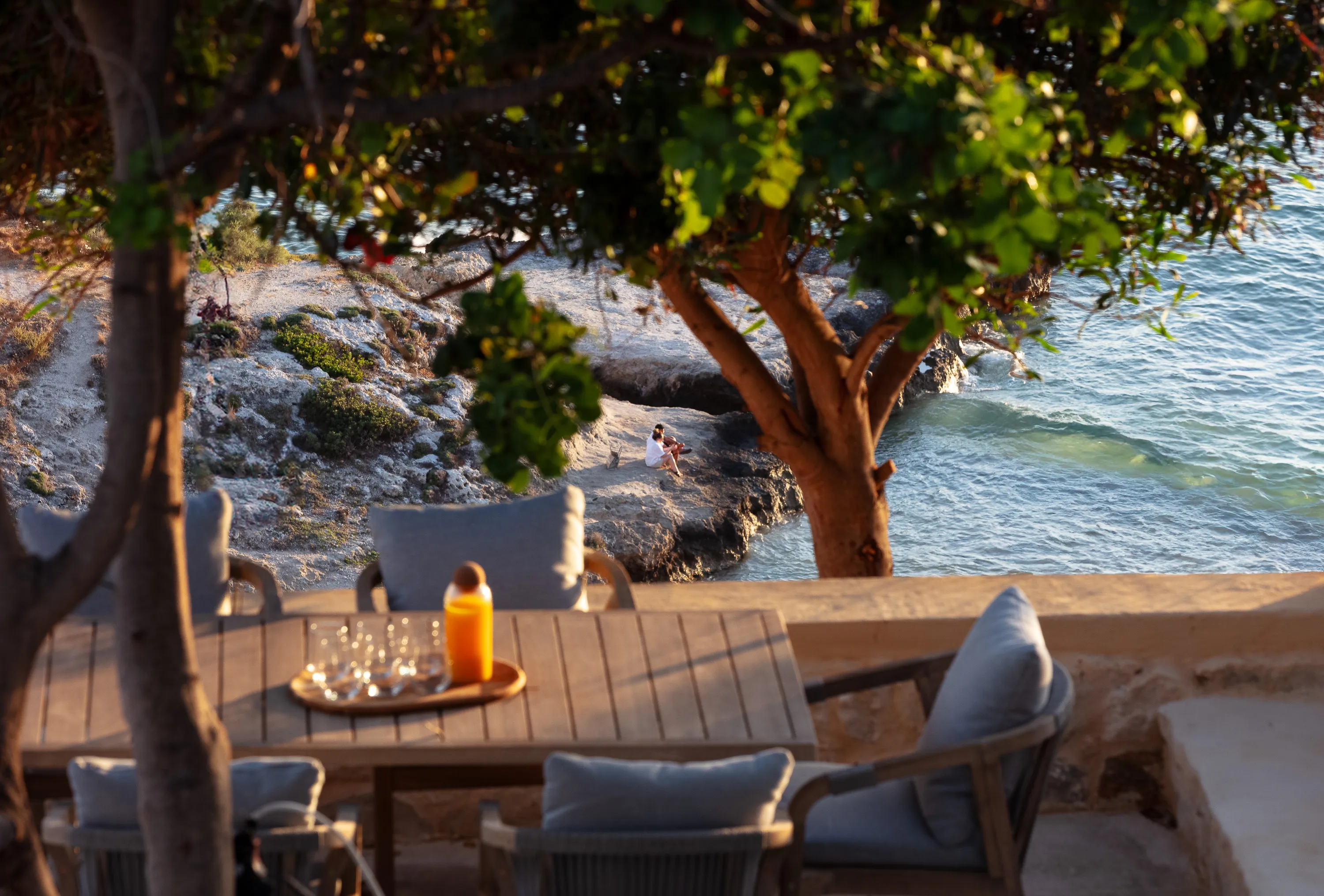 Enjoy your morning coffee while listening to the waves hit the shore