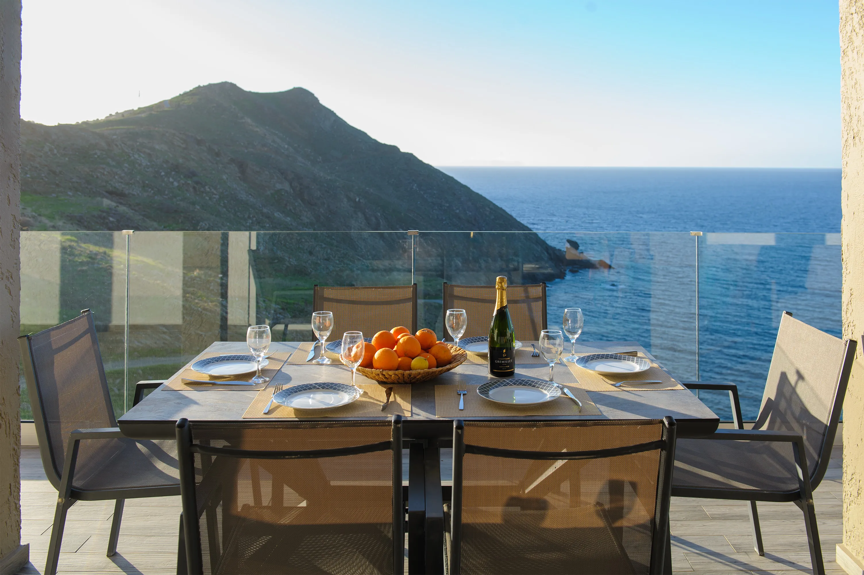Outdoor dinning area with amazing sea view for 6 guests.