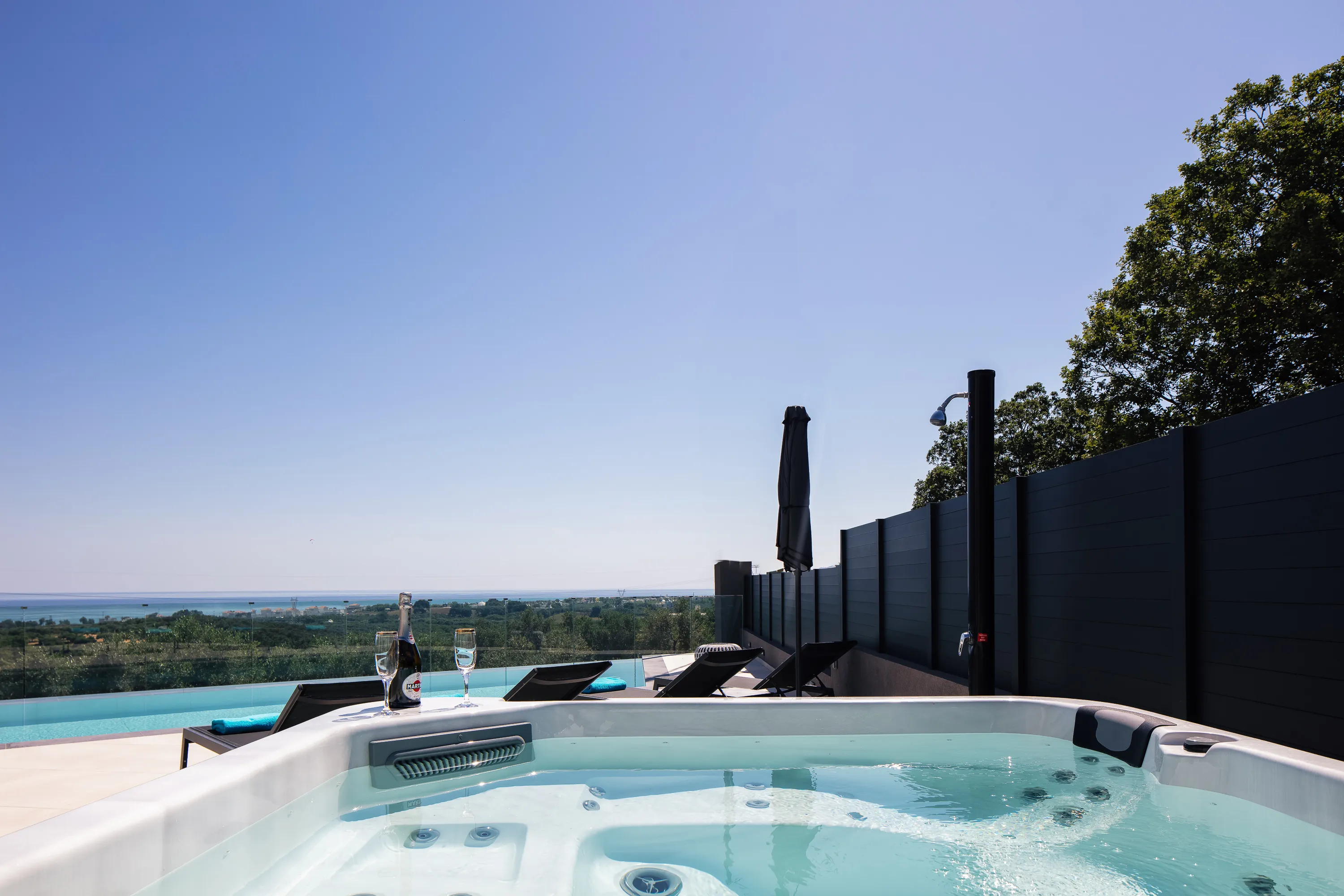 For ultimate relaxation, indulge in the hot tub, accommodating up to 5 people, and immerse yourself in its soothing waters.