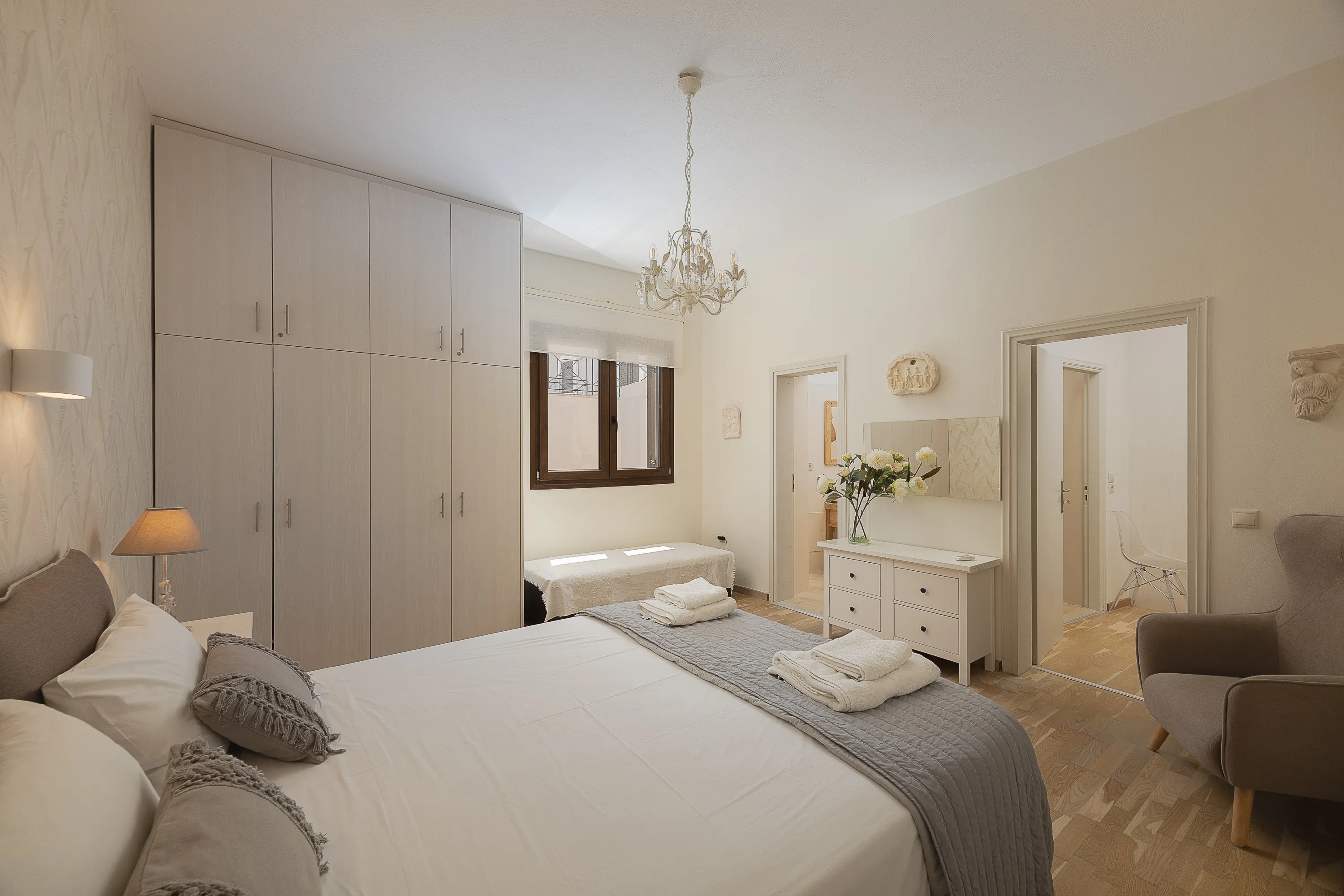 The two bedrooms on the first floor share a bathroom with a shower cabin