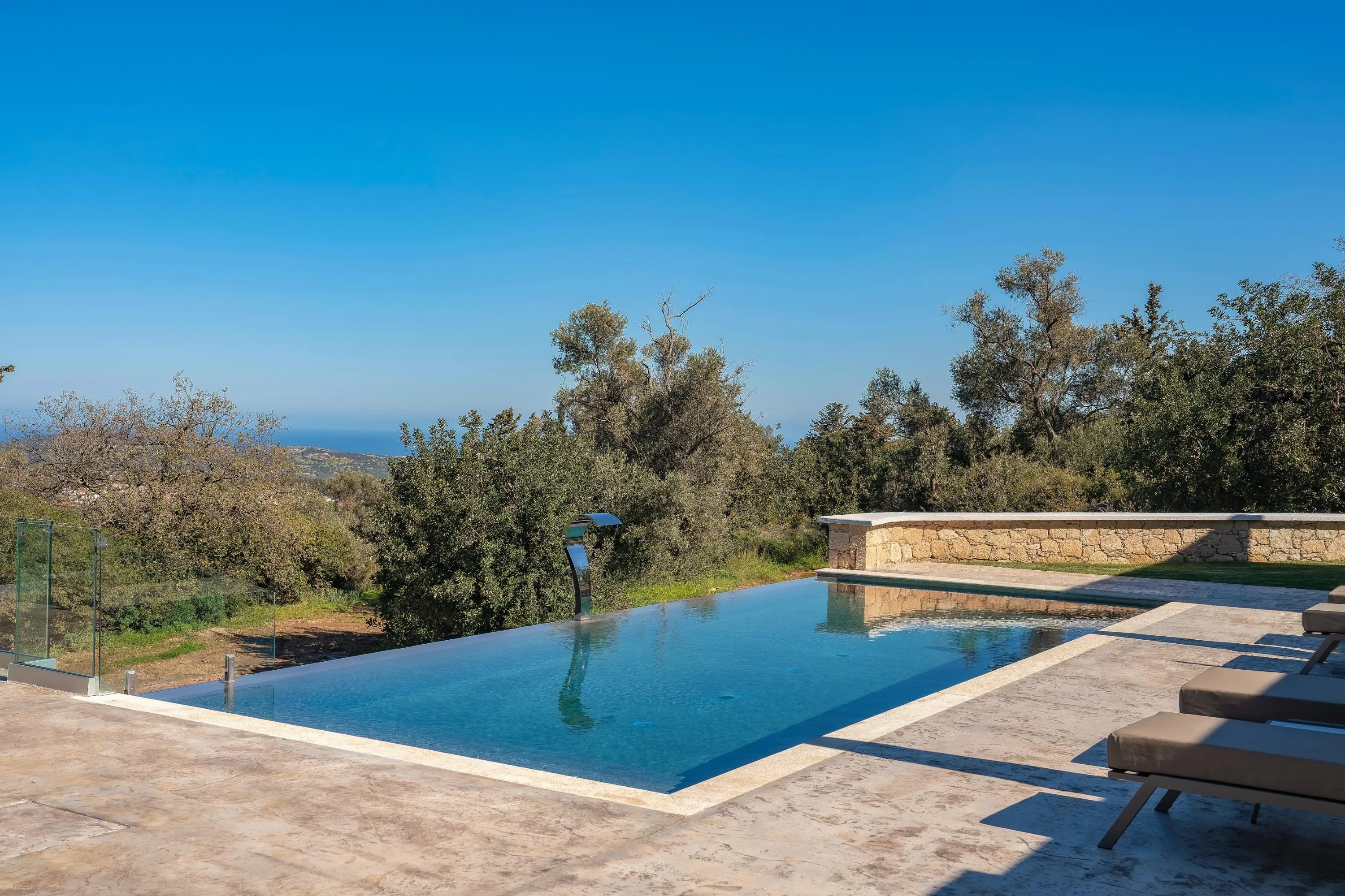 Bask in the sun with sea and green views combined