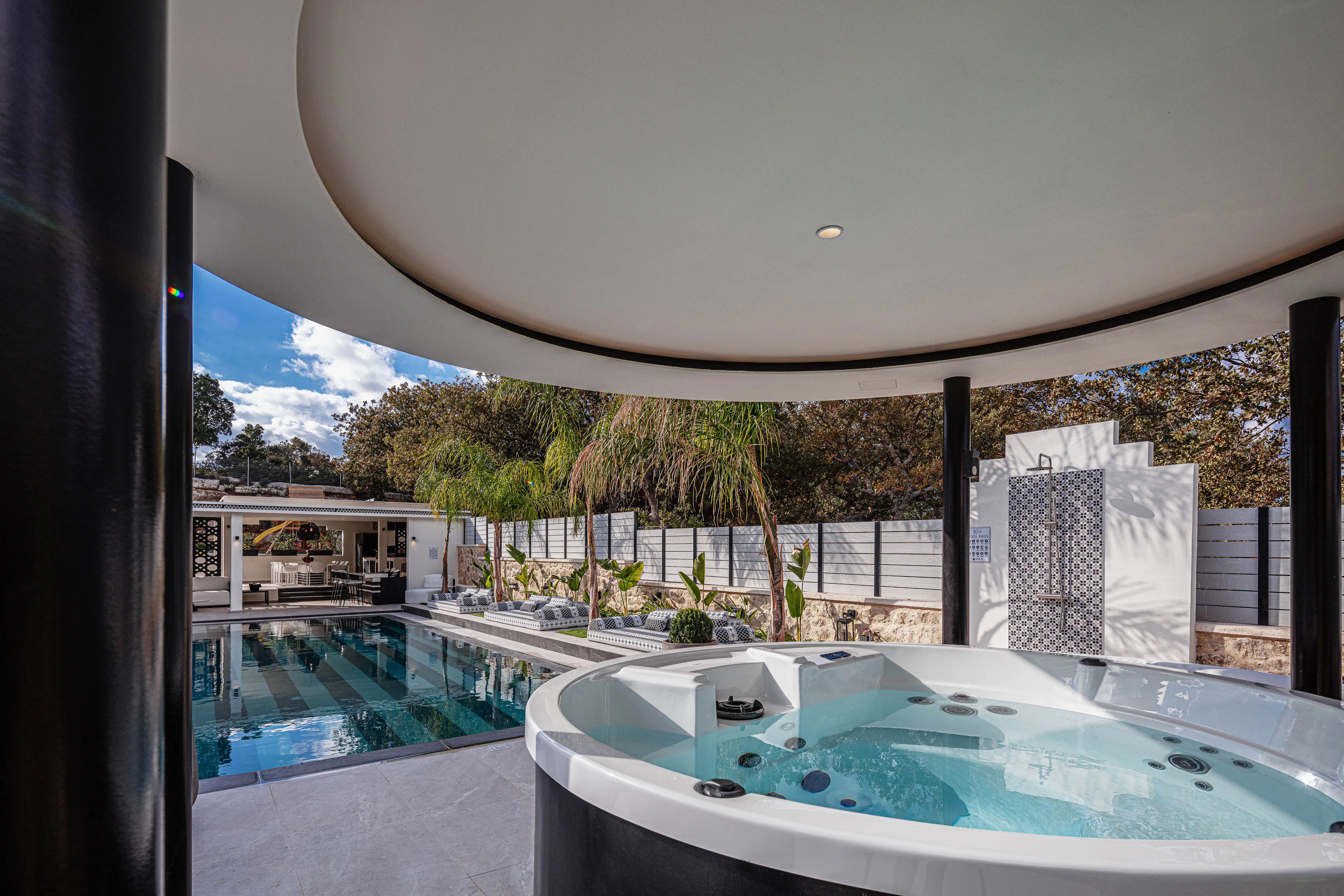 Jacuzzi with seating for 5, perfect for relaxation.
