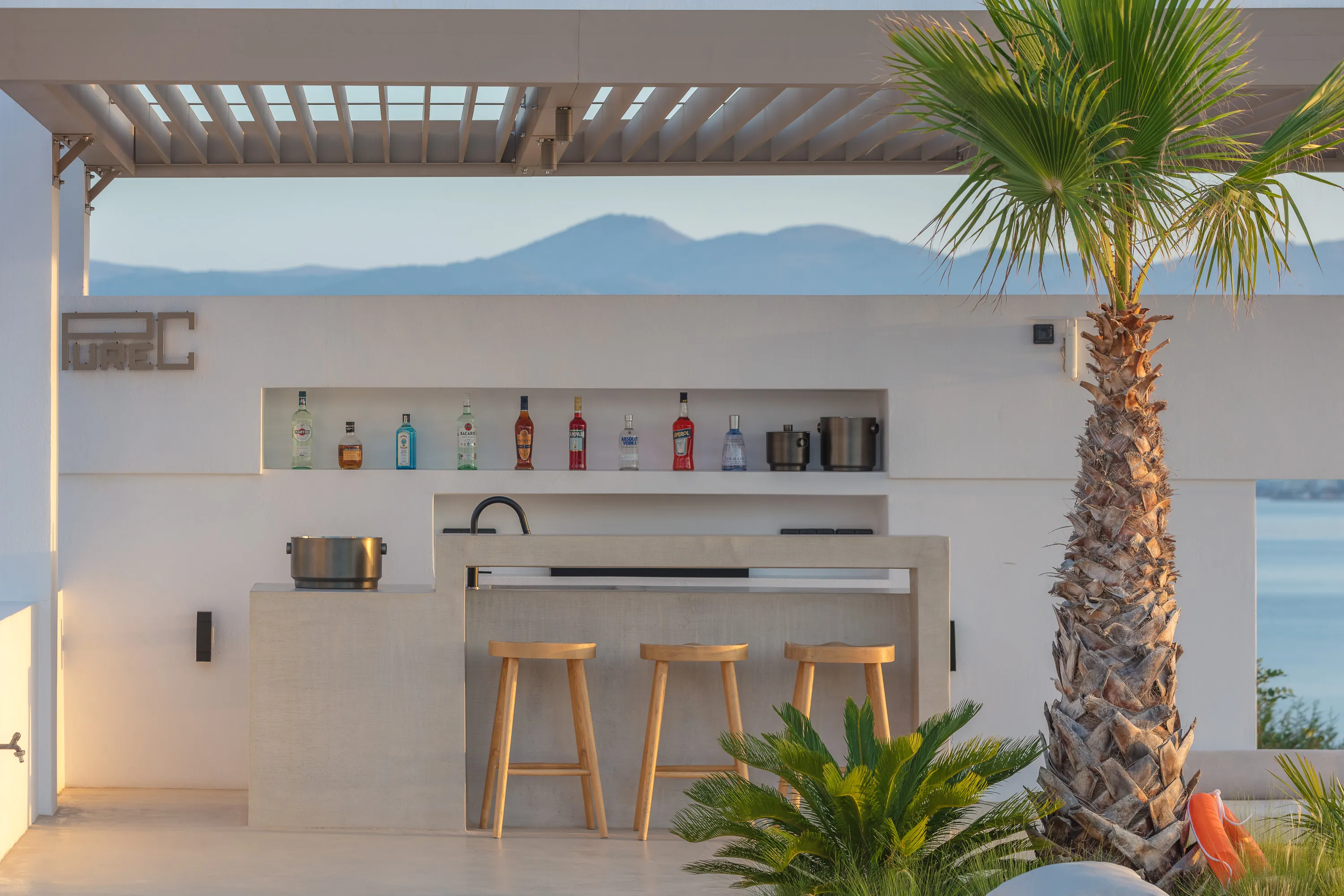 Enjoy a refreshing cocktail at the bar