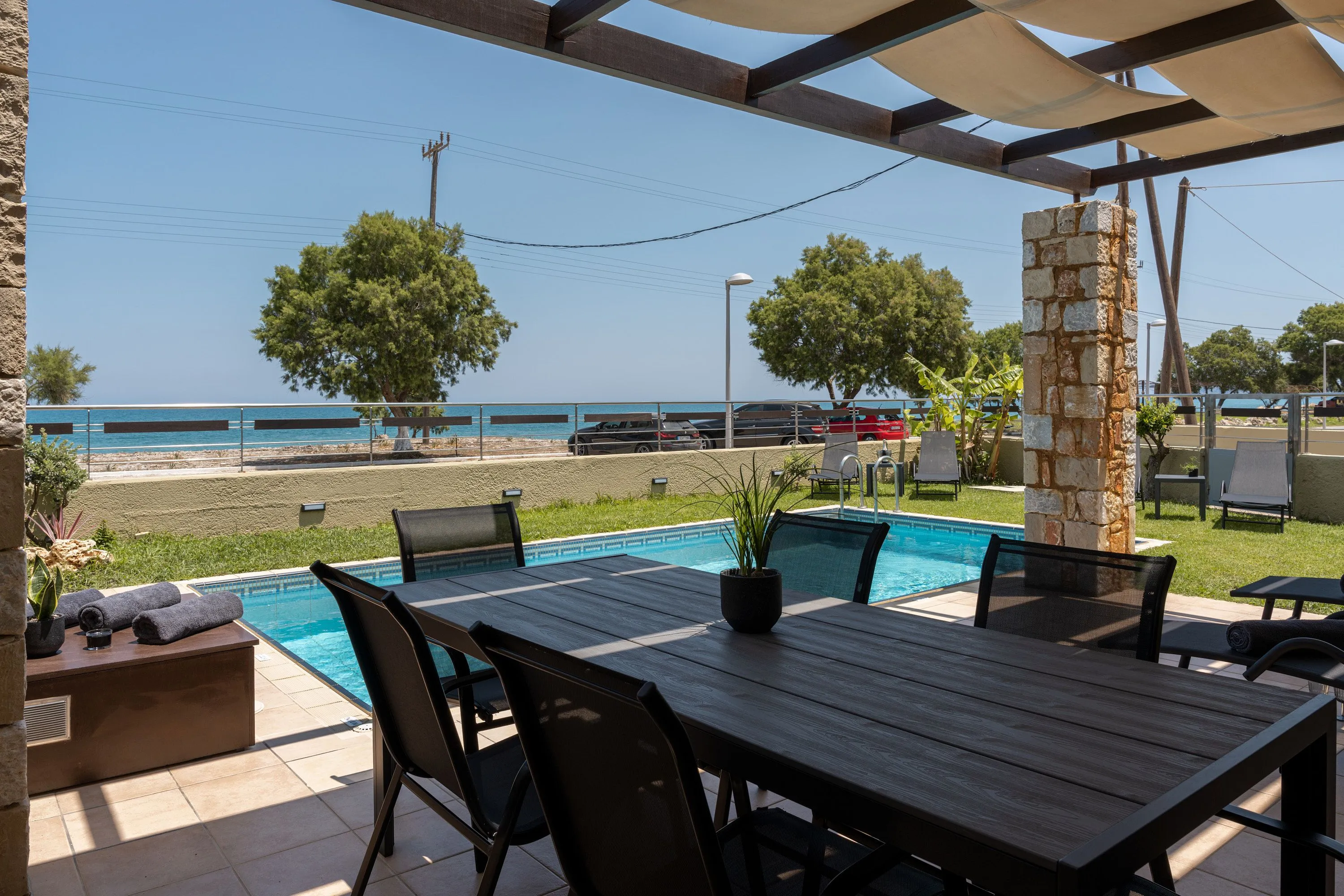 Indulge in delightful dining experiences at the outdoor dining area, with seating for six guests.