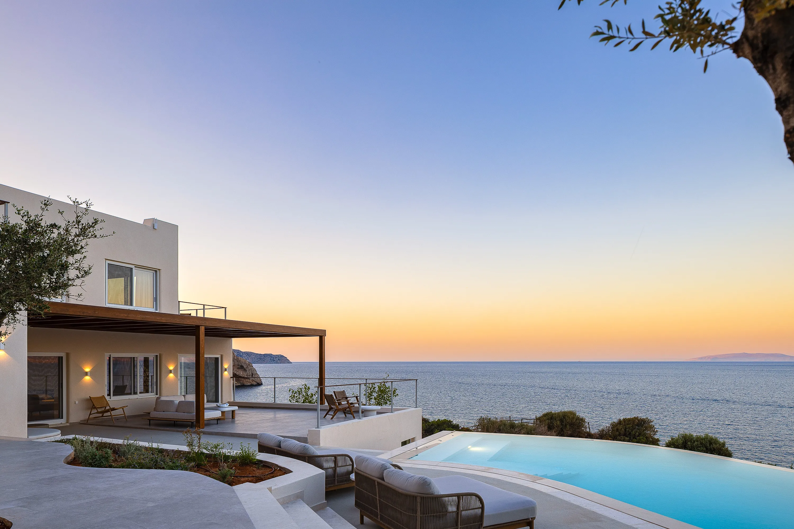 Surrounding the pool area are eight sunbeds, poof loungers, four daybeds, side tables, two poolside showers, and umbrellas