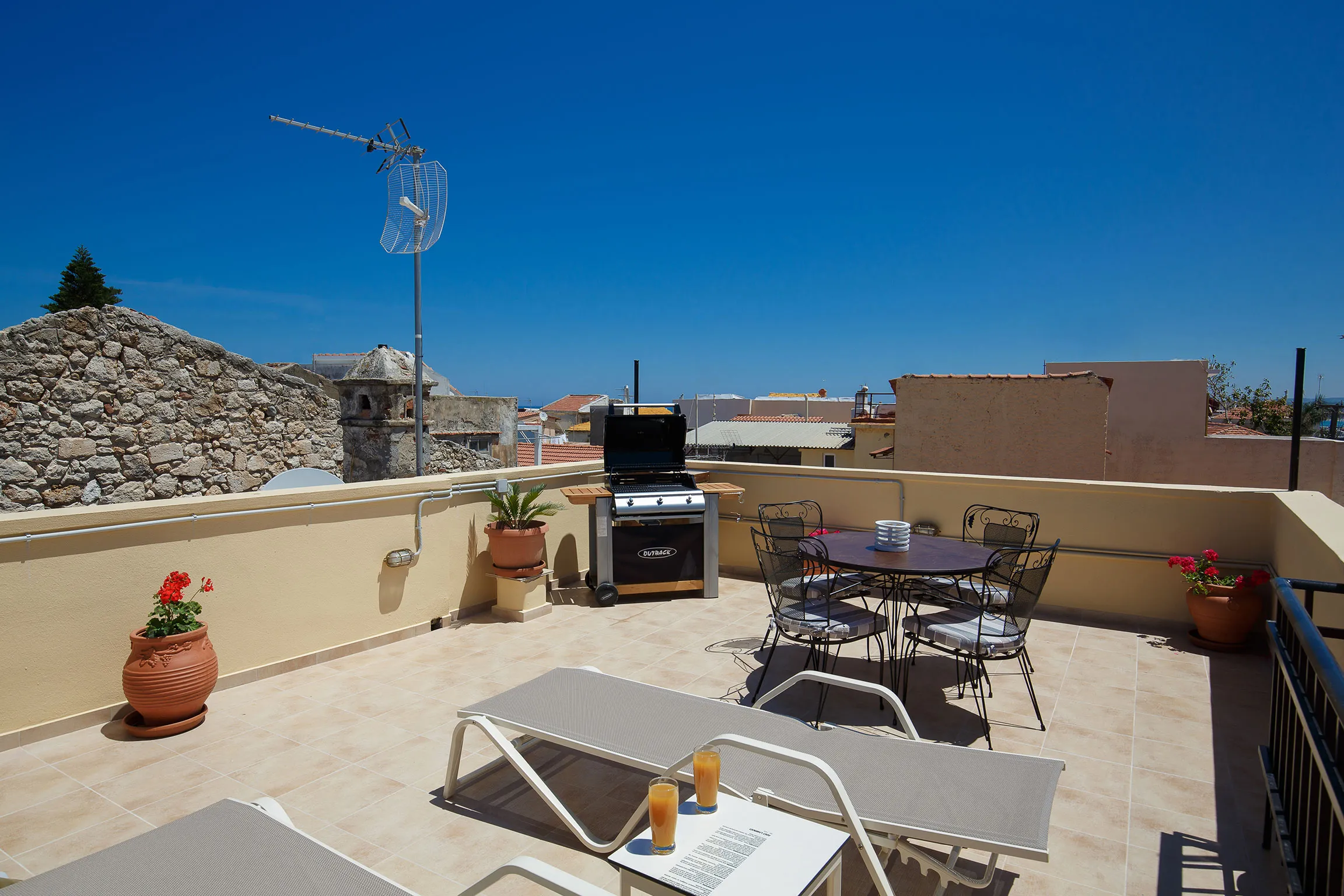 Have a sunbath and enjoy the view on our Rooftop terrace