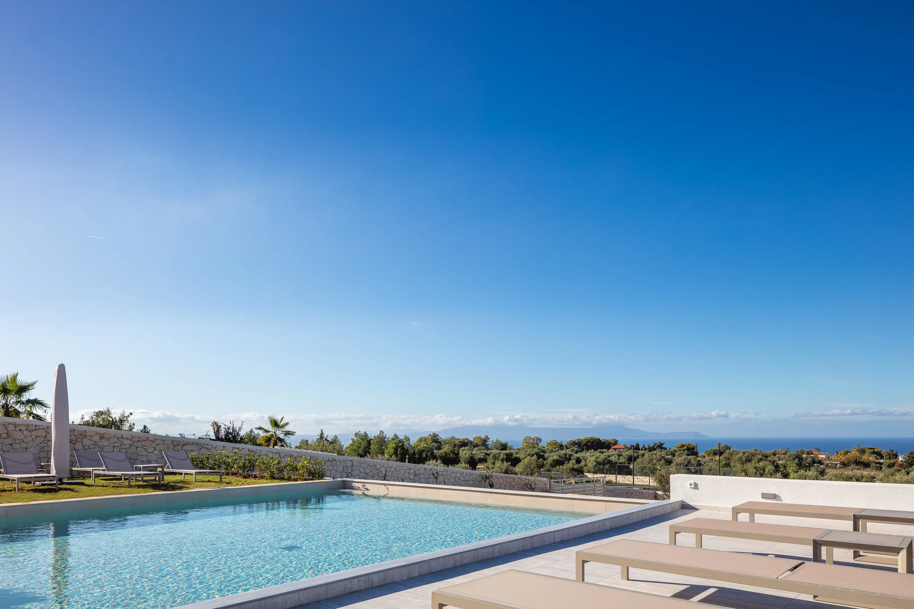The poolside is thoughtfully furnished with 12 sun beds!
