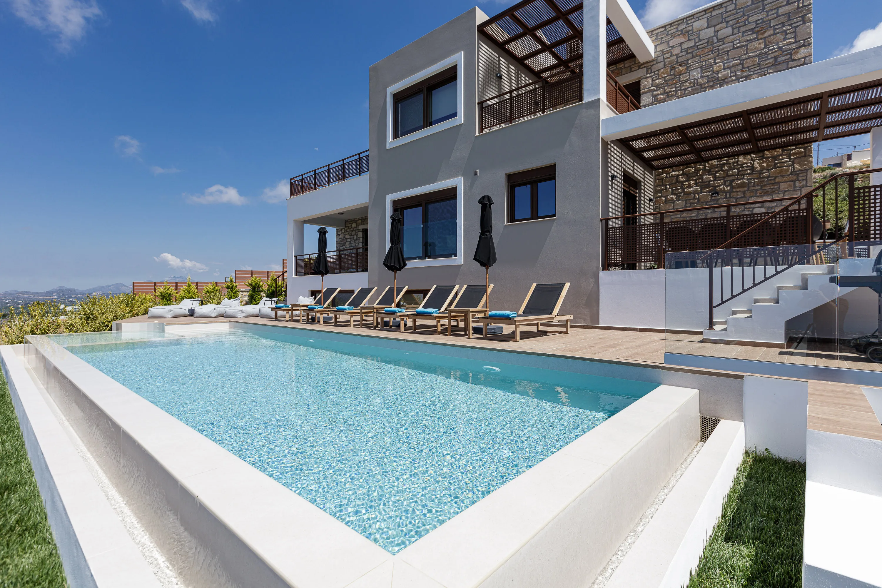 The 290 m2 villa is spread throughout three floors
