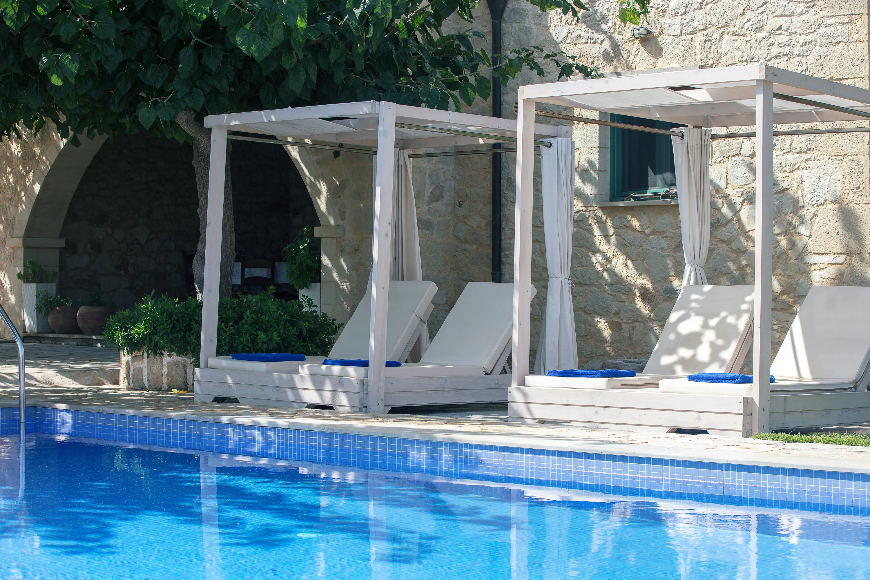 The villa is set in a quiet location with a spacious outdoor area