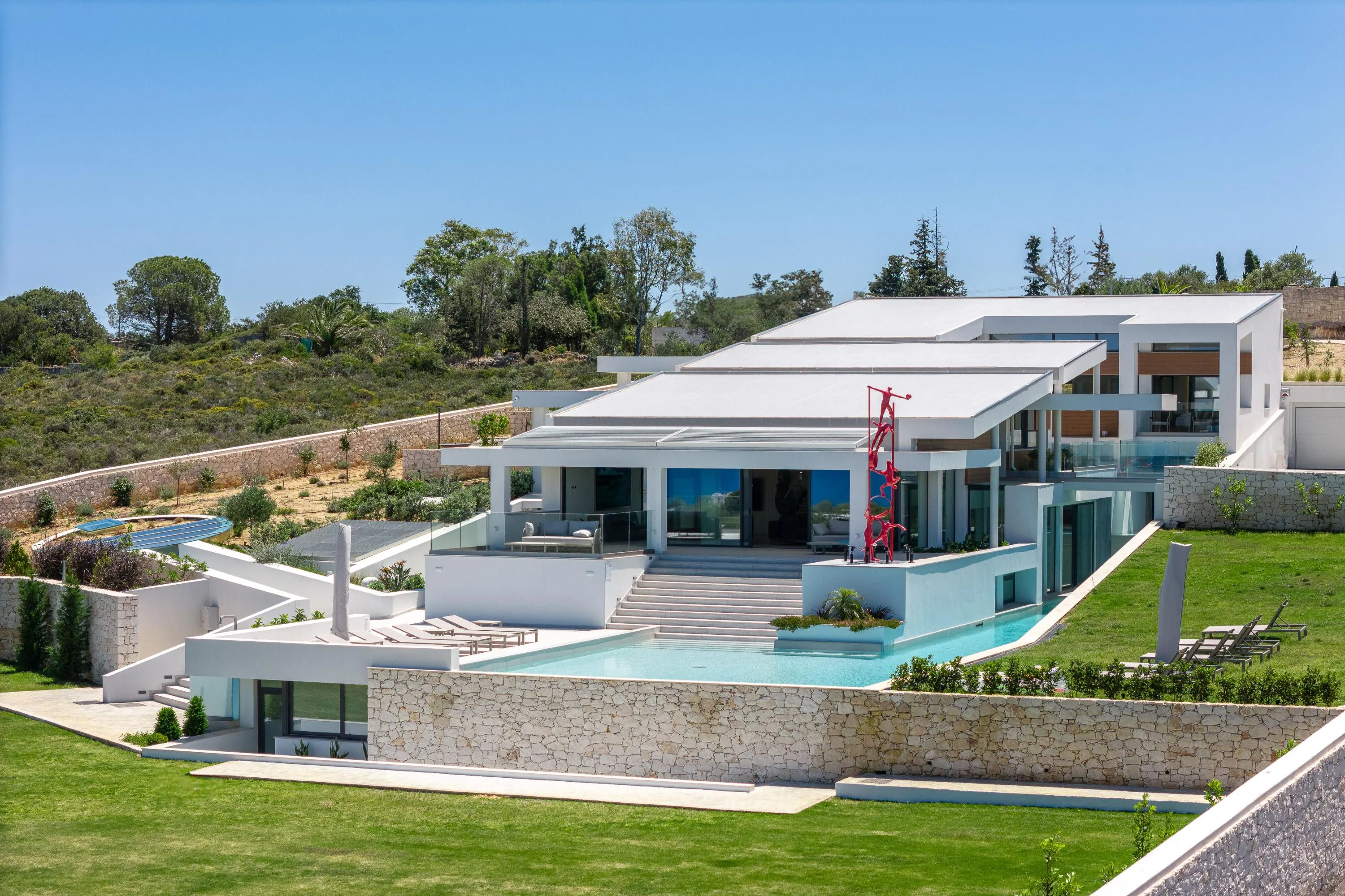 A private, L-shaped, 136 sq.m. ecological salt water swimming pool, (0,70 - 1,40 m deep)