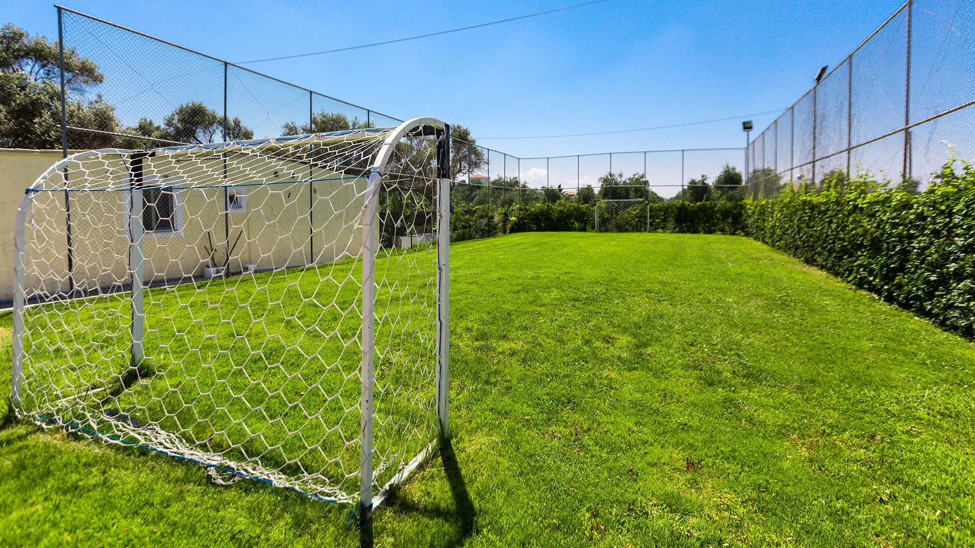 Private mini soccer field with natural grass!