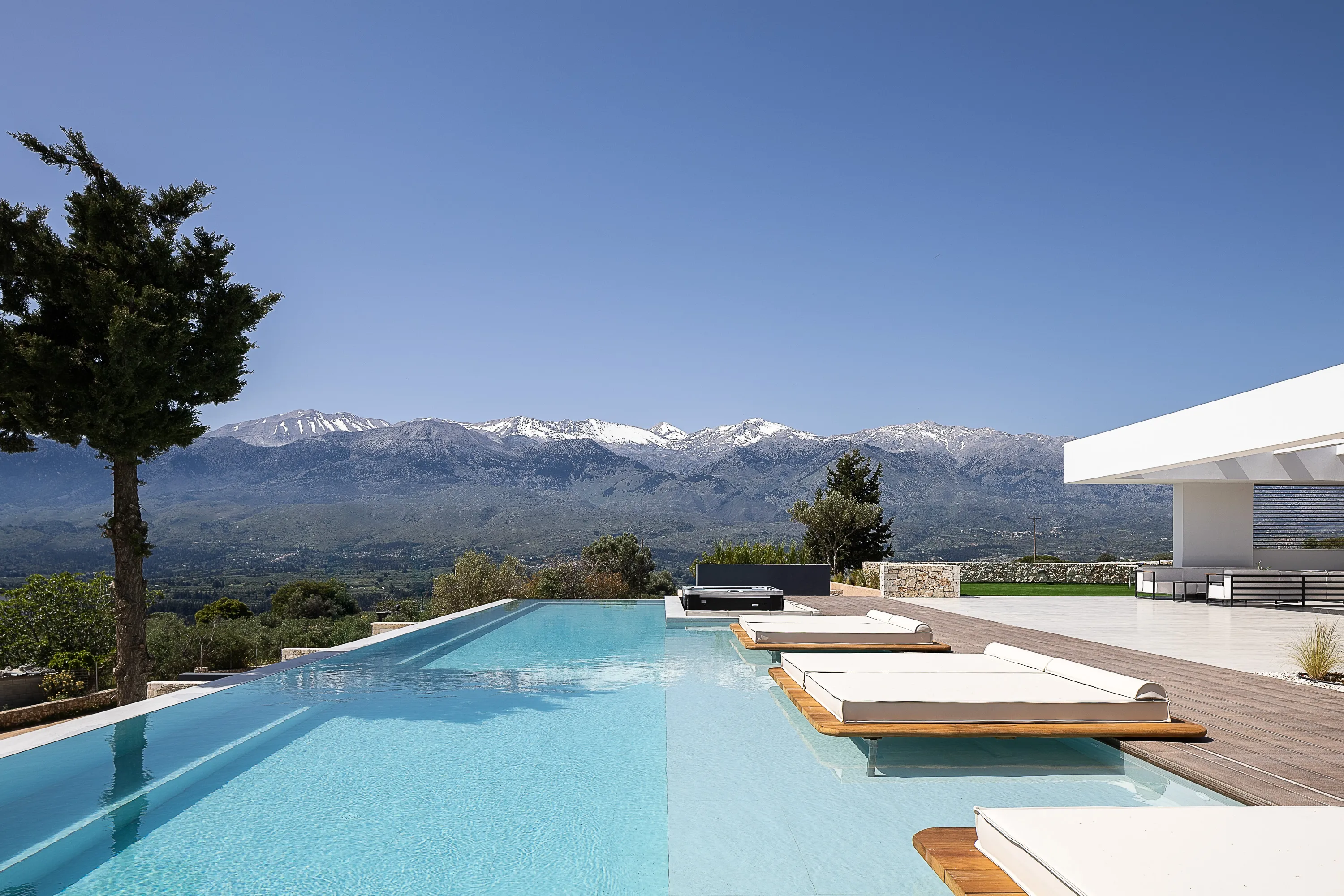 Nestled on a vibrant landscape with breathtaking mountain views